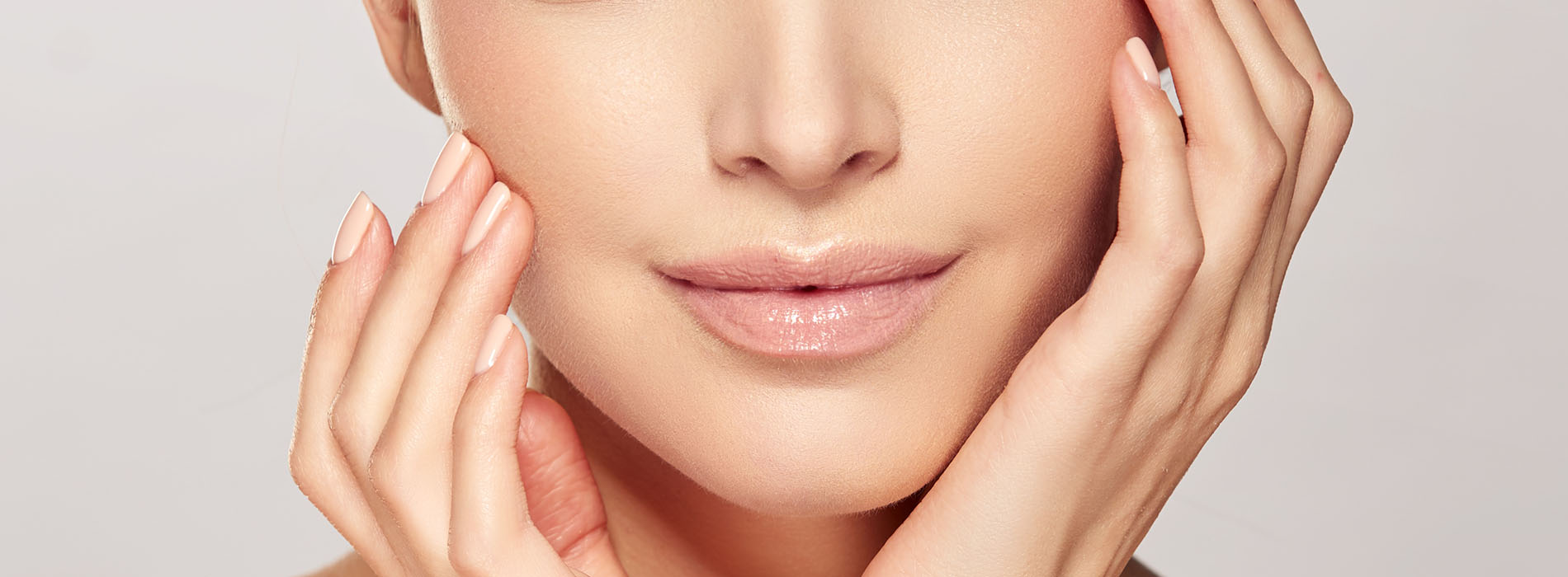 A close-up of a person s face, showcasing skincare product application.